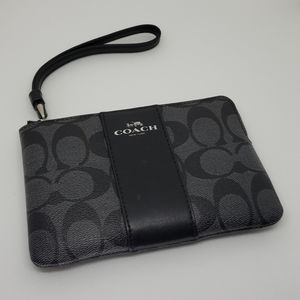 Coach black and silver coated canvas wristlet